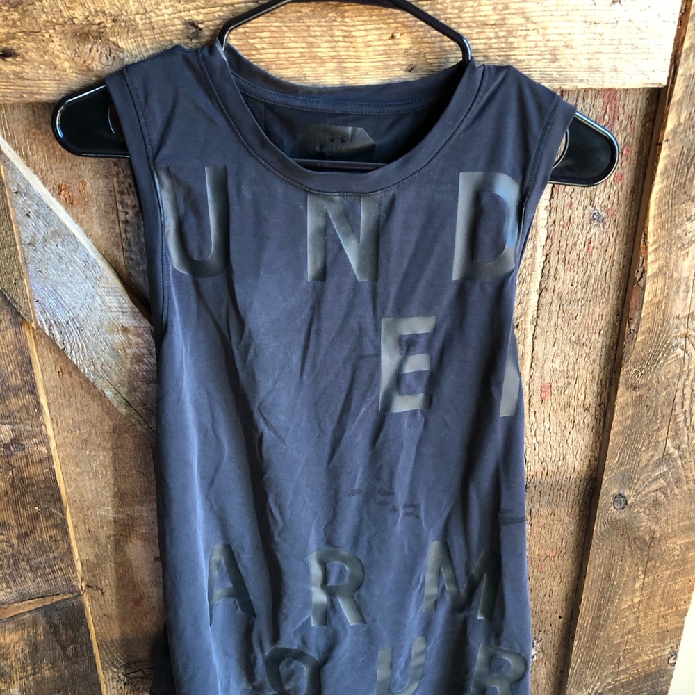 Under Amour tank black large fitted. Open back.
